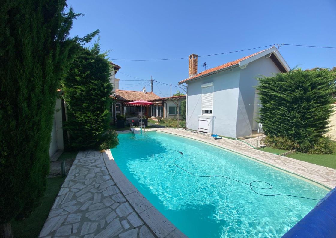 Rénovation d'une maison en _U_exterieur-piscine